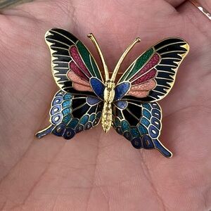 Vintage Multi Color butterfly brooch with gold accents.